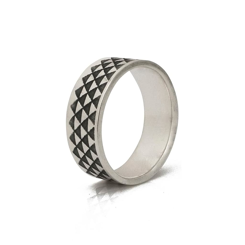 triangle ring oxidised seen from a side on a white background