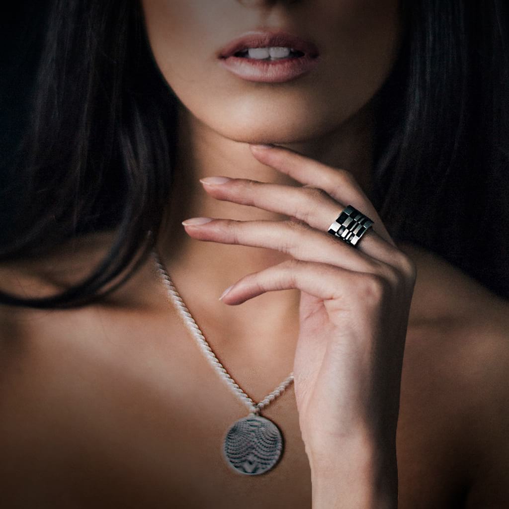 woman hand touching her chin