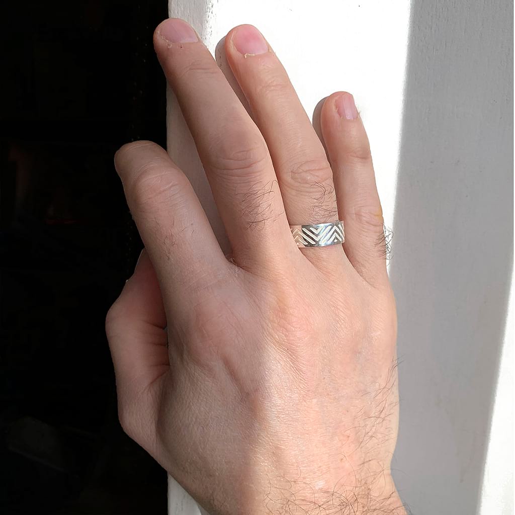 Hand against a wall with shadow play