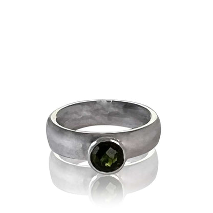 Chunky silver ring with green tsavorite