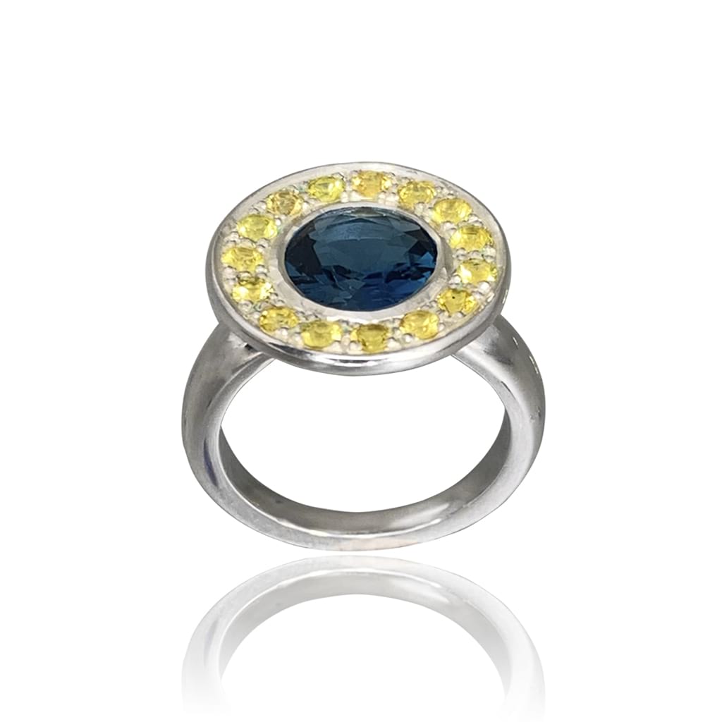 Halo Ring with blue Topaz and yellow Sapphires