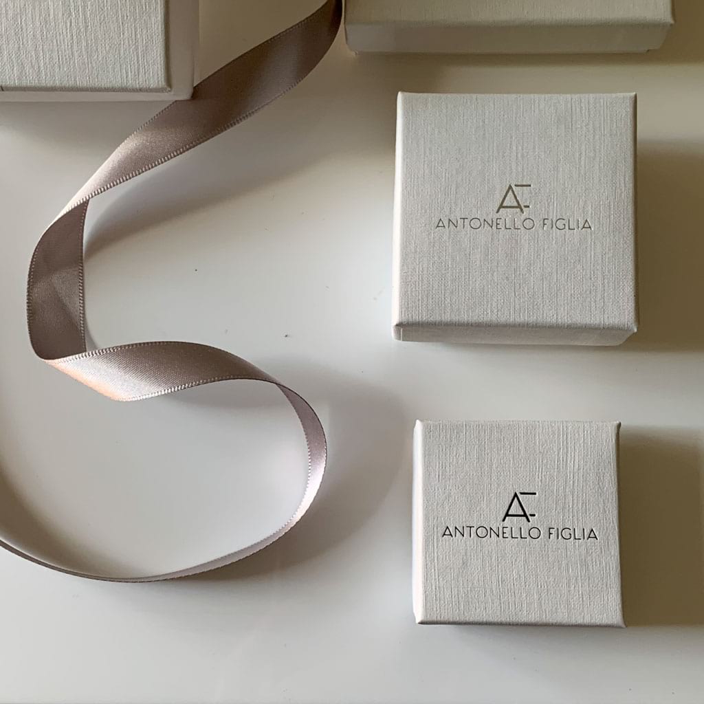 white jewellery packaging in different sizes