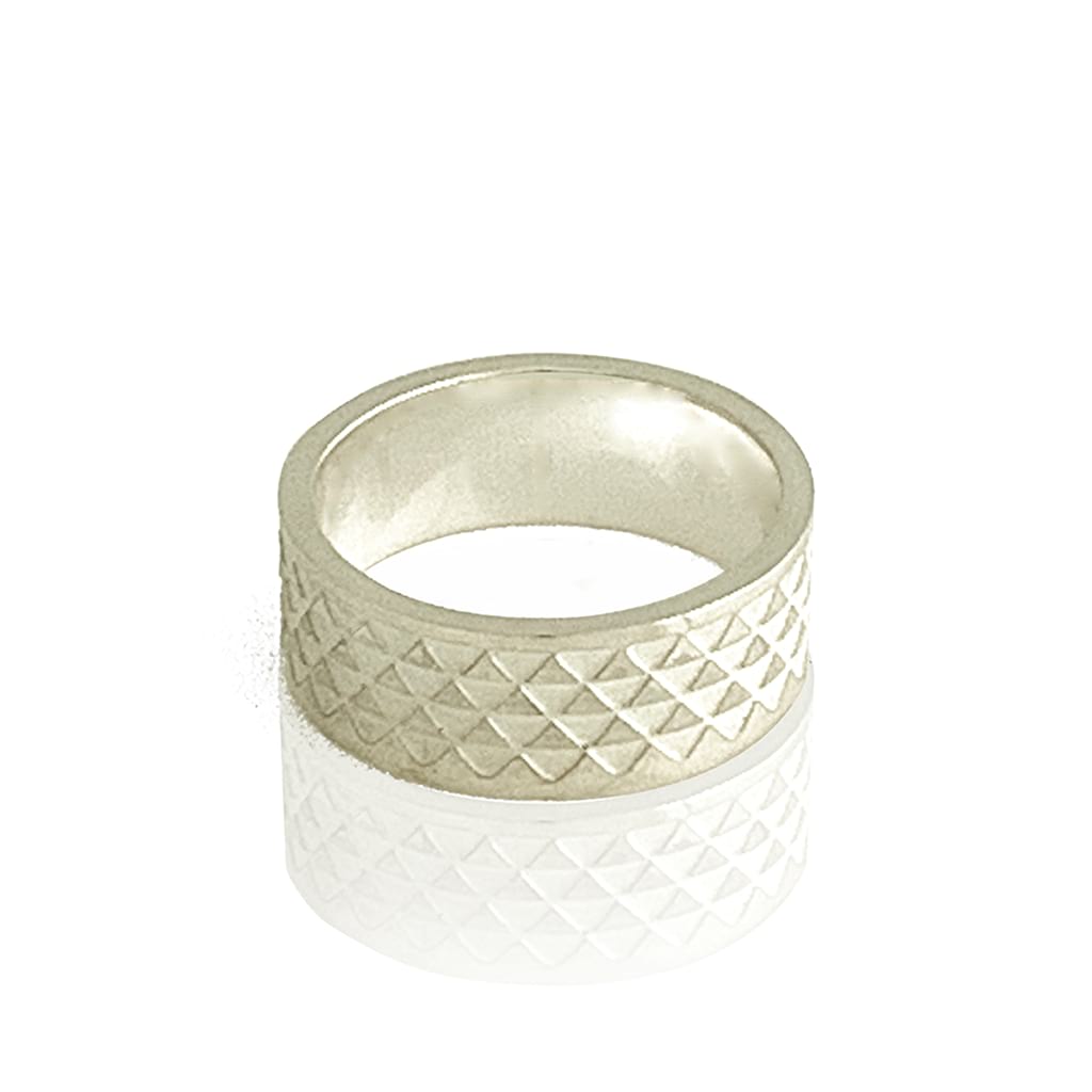 triangle ring highly polished flat on white background