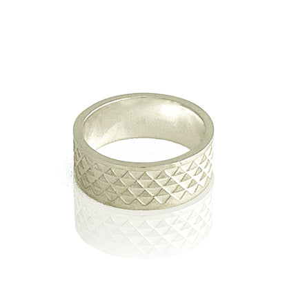 triangle ring highly polished flat on white background