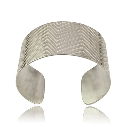 Wide Silver Oval Cuff With Etched Lines on a White Background Front